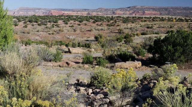 Long, beautiful view of the red rocks at Ghost Ranch from the Army Corps of Engineers&rsquo; Abiquiu Lake in northern New Mexico, USA