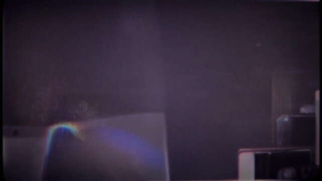 Vintage Film Grain Overlay with Subtle Light Leaks.