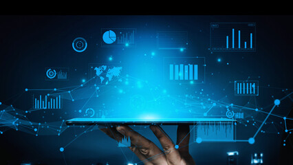 A hand holds a tablet showcasing a vibrant display of data visualizations and analytical graphs, highlighting the intersection of technology and information analysis. Xenic