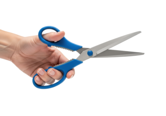 Adult pale hand gripping blue-handled office scissors, blades poised open, isolated on a bright white studio background with copy space, high-key macro product shot. Concept of project preparation