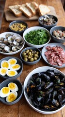 Table spread with seafood, meat, and veggies