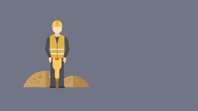 Construction worker operating a jackhammer in dirt