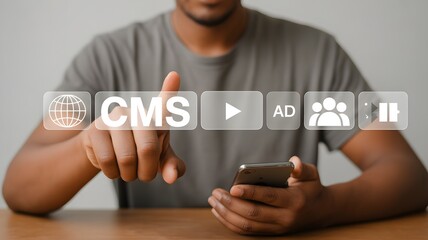 CMS content management system concept, Person using smartphone with content management system icon on virtual screen for business website management.