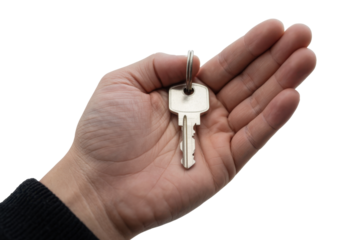 Hand holding a shiny silver key