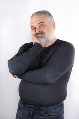 Portrait of a bearded middle-aged man with gray hair
