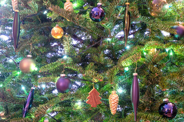 Close-up view of a decorated natural Christmas tree