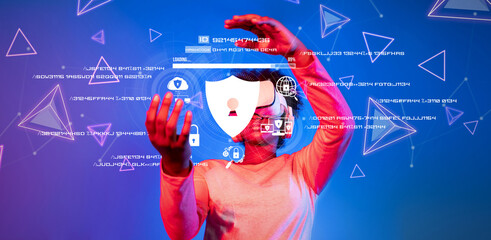 A person interacts with digital symbols representing cyber security, emphasizing the importance of...