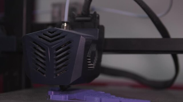 CloseUp D Printer Extruder Testing Filament Flow And Calibration On Heated Bed Measurement Of Layer Consistency, Quiet Lab Atmosphere, Focus On Nozzle Movement And Material Behavior