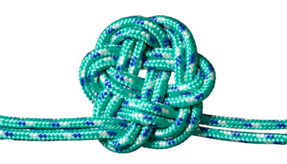 Decorative celtic knot made of green and blue rope cut out