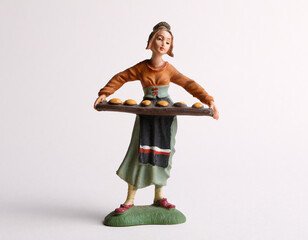 A girl selling pastries figurine