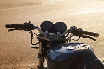 Motorbike on the road with sunset