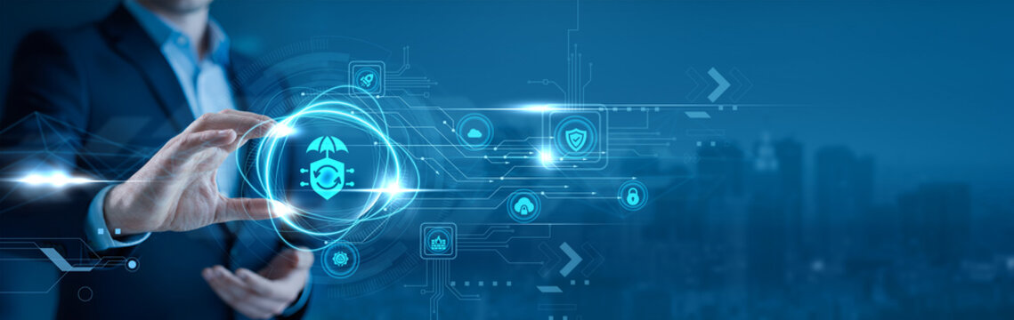 Businessman holding a cybersecurity shield in his hand digital protection, network security, data privacy, threat prevention, information technology safety, secure business systems - Powered by Adobe