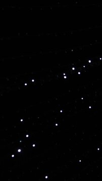 Sparse Starry Sky With Drifting Stars, Black Void Punctuated By Faint Pinpricks And Subtle Streaks, Slow Gentle Motion Evokes Solitude And Contemplation, Perfect Ambient Background