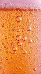 Bubbles rising in fizzy drink glass during afternoon
