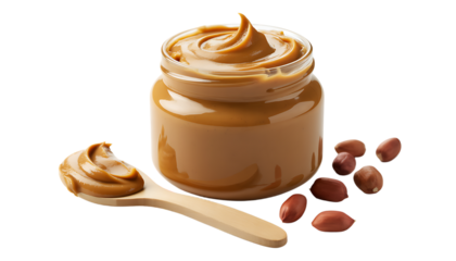 Smooth peanut butter in jar, spoon, and peanuts around it. Isolated on black