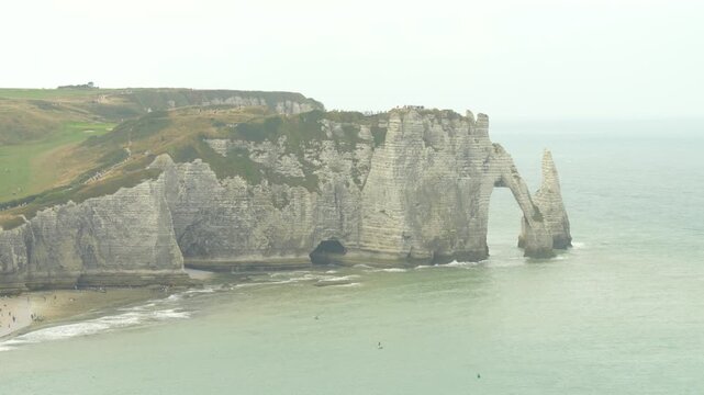 Etretat natural arch and coastal cliffs in Normandy France