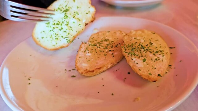 Garlic bread with parsely on the top