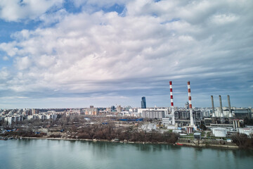 Fototapeta premium Belgrade thermal power plant and city skyline from drone