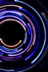 A long exposure photograph. Light painting photography, vibrant fairy lights against a black background