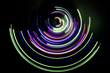 A long exposure photograph. Light painting photography, vibrant fairy lights against a black background