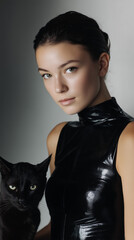 Fashion Editorial Portrait of Elegant Woman With Black Cat on Neutral Background