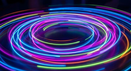 Abstract Colorful Light Trails in a Spiral Motion on a Dark Background