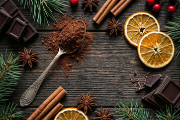 Flat lay composition of cocoa powder and winter spices