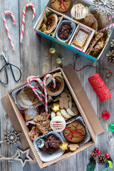 Homemade baking in cookie boxes to give away as Christmas gifts.