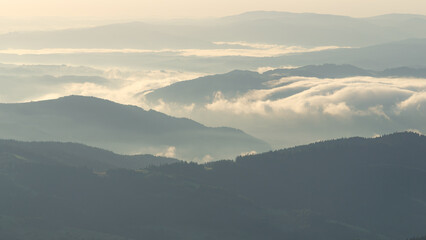 Misty mountain layers with soft fog and atmospheric depth