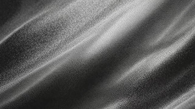 Shimmering black cloth subtly textured waves
