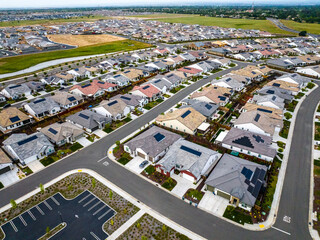 aerial view of a Roseville, California middle class brand new residential houses neighborhood in a city suburbs. suburbia