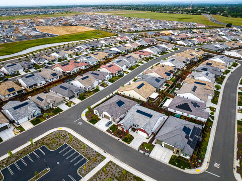 aerial view of a Roseville, California middle class brand new residential houses neighborhood in a city suburbs. suburbia