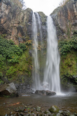 Salto da Farinha waterfall, water crashing with great impact against the rocks, S&atilde;o Miguel Island in the Azores archipelago, Portugal.