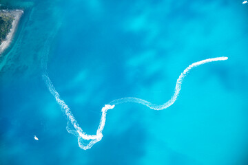 Queensland ocean and Whitsunday Islands captured from above with aerial view of islands and coastline