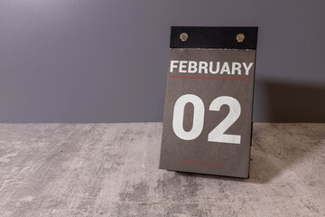 Day 2 of february month, Wooden calendar with date. Empty space for text