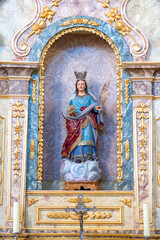 Obraz premium Resin statue of Saint Lucy inside the Church of Bom Jesus in the parish of Rabo de Peixe, São Miguel, Azores, Portugal.