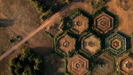 Aerial View of Geometric Hexagonal Patterns in Historical Ancient Landscape Surrounded by Nature and Pathways