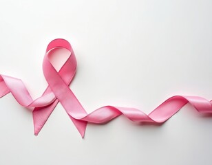 Pink ribbon awareness symbol on white background. Represents fight against breast cancer, woman health, solidarity, hope and support for patients. Medical research and prevention campaign material.