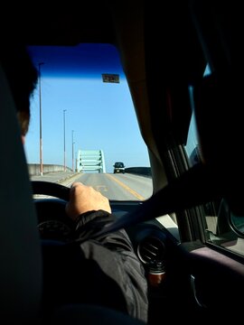 Scenic view of Lake Biwa from a car on a sunny day