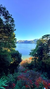Refreshing daytime view of a boat wake on Lake Biwa