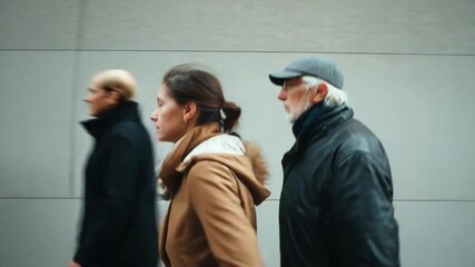 City Stroll: Captured in a moment of urban exploration, three figures walk against the backdrop of a modern city, each absorbed in their thoughts. 