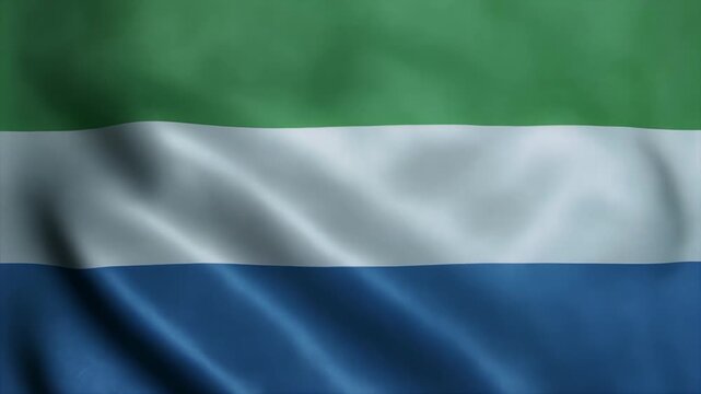 Flag of Sierra Leone waving in the wind with green, white, and blue colors