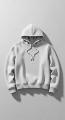Top-down flat lay of a blank hoodie jacket mockup on a light gray background, minimalist composition