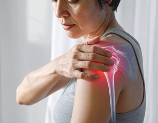 Mature Female Massaging Sore Shoulder, Muscle Tension and Pain Relief