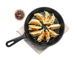 japanese gyoza in pan with sauce isolated on transparent png