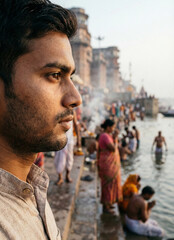 Indian Man Praying in River During Sunrise