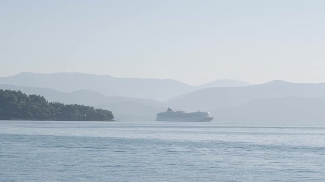 Ferry boat sail among tropical Greek islands in morning