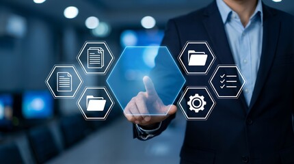 Businessman's finger touches a hexagonal interface displaying icons representing documents folders checklists and gears suggesting data management and operational processes Technology