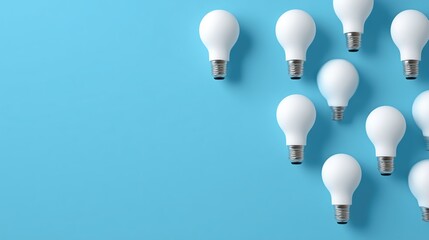 `A bright cluster of white light bulbs symbolizing innovation, business growth and collaborative ideas on a clean blue background.`