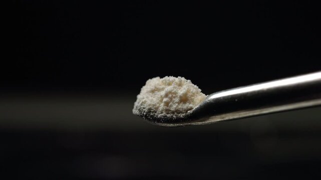 Display of fentanyl powder on medical spoon. Two milligrams of drug is lethal dose for people. On the streets fentanyl can be injected, snorted sniffed, smoked, taken orally by pill or tablet.